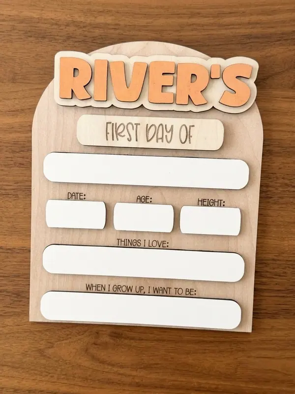 First day of school sign engraved in the River font